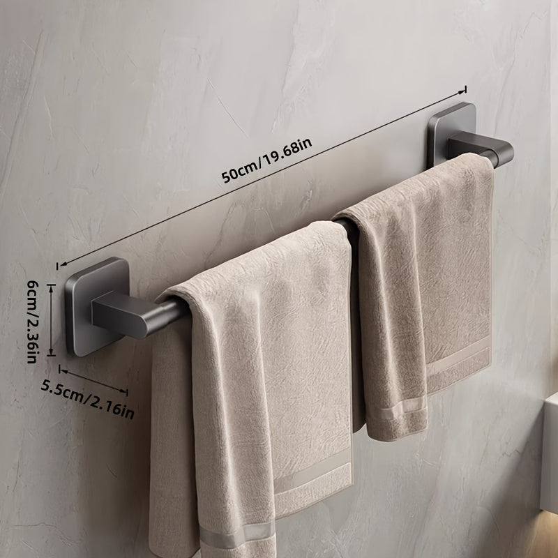 Wall-mounted towel rack for bathroom made of durable space aluminum and plastic. Easy installation with no drilling required. Single rod design for organizing towels.