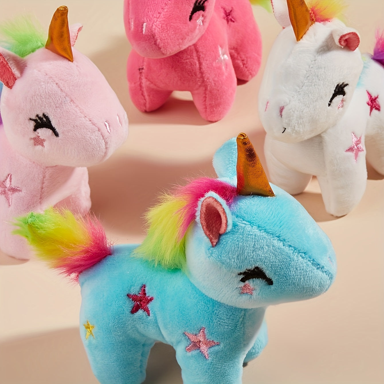 Adorable Unicorn plush toy with star accents, ideal for small pets.