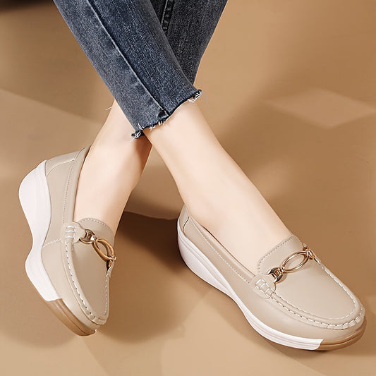 Versatile beige slip-on loafers for women with thick, non-slip soles and decorative buckle detail. Comfortable and lightweight for all-season wear.