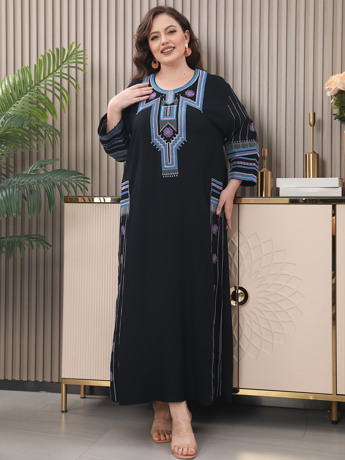 Embroidered kaftan dress in tribal pattern, loose fit, suitable for all seasons, made from polyester blend with rayon and spandex, has three quarter length sleeves and non-stretch woven