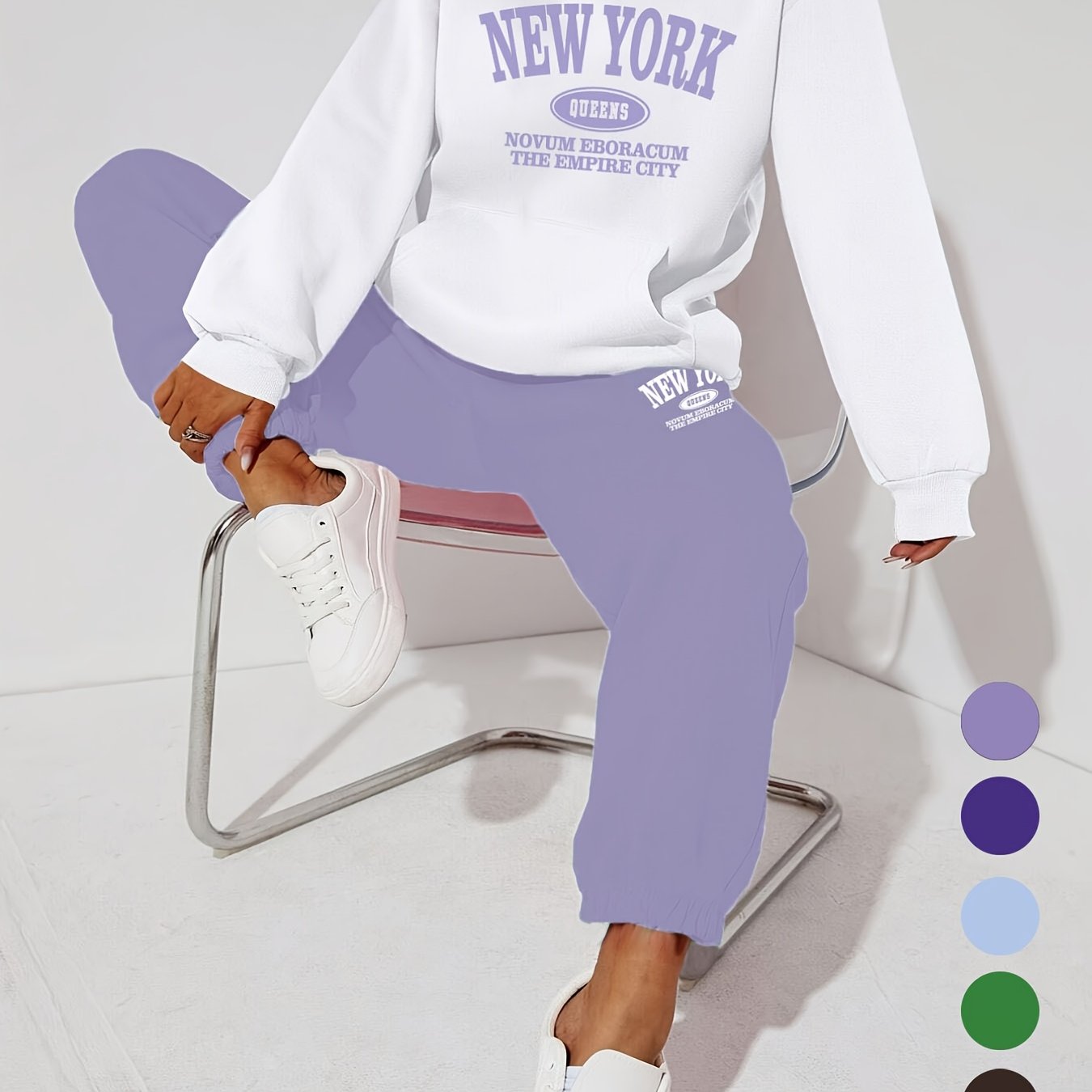 Women's casual 2-piece set featuring a long-sleeve hooded sweatshirt with drawstring and matching pants in polyester knit fabric with alphabet pattern. Suitable for all seasons, this