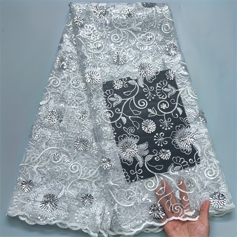 4.57 meter cut of Floral Sequin Tulle Lace Fabric, ideal for bridal gown sewing. Made of 100% Polyester, hand wash only.