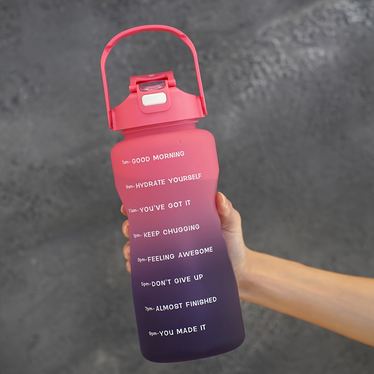 68oz gradient water bottle with motivational time markers, leak proof straw, ideal for running and sports, hand wash only, PVC free, great holiday gift option.