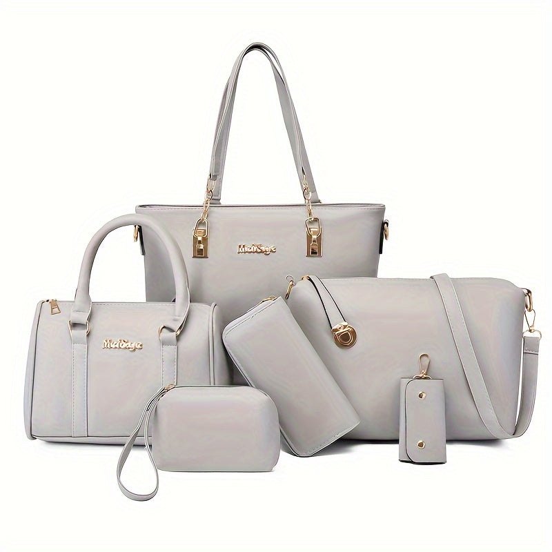 Large cross-body bag for mothers made of PU material with six compartments.