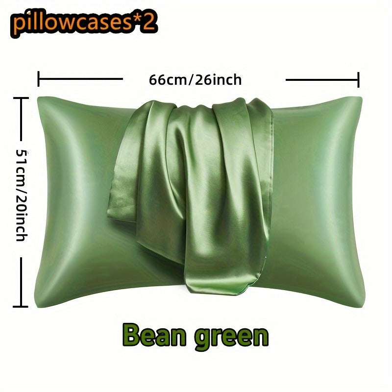 Two pieces of luxurious satin pillowcases available in various colors. These pillowcases feature a smooth and glossy finish with an envelope closure for convenience. They are machine washable and made of 100% polyester. No filler is included.