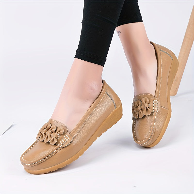 Women's flat shoes with bow detail, solid color, round toe, slip-on design for casual walking.