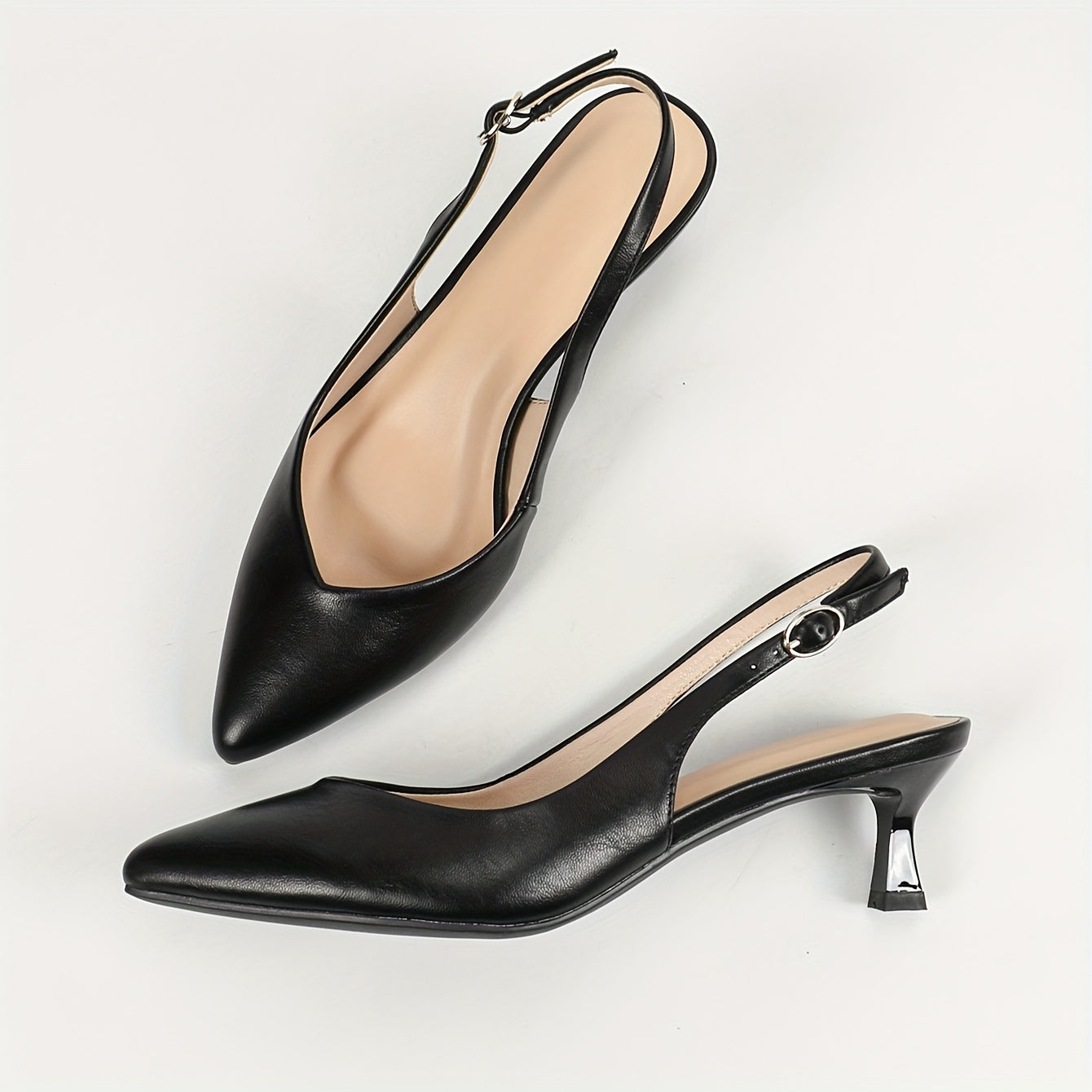 Stylish women's slingback shoes with pointed toe, mid-heel, solid color, and faux leather cover on rubber sole.