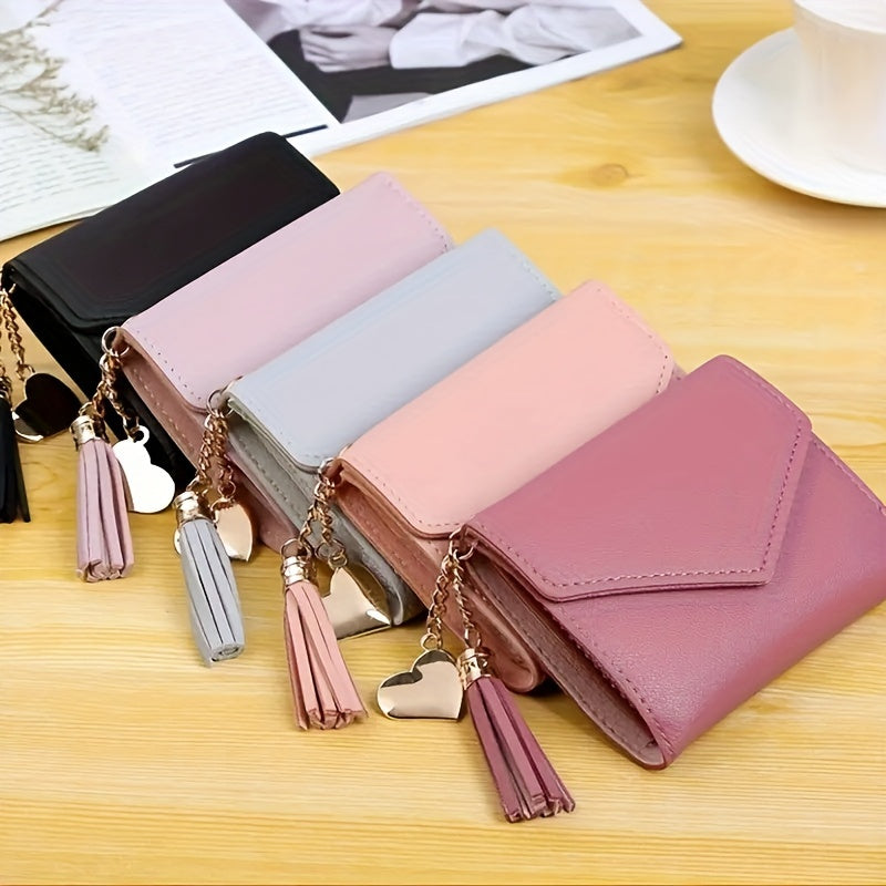 Compact trifold wallet for women with faux clutch coin purse, minimalist credit card holder, stylish tassel charm, and versatile for daily use.