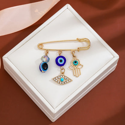 Set of 2 Vintage Crystal Diamond Evil Eye Tassel Brooches in Blue, High-End Waist Pulling Sweater Pin with Cold Wind Detailing, Random 2 Styles