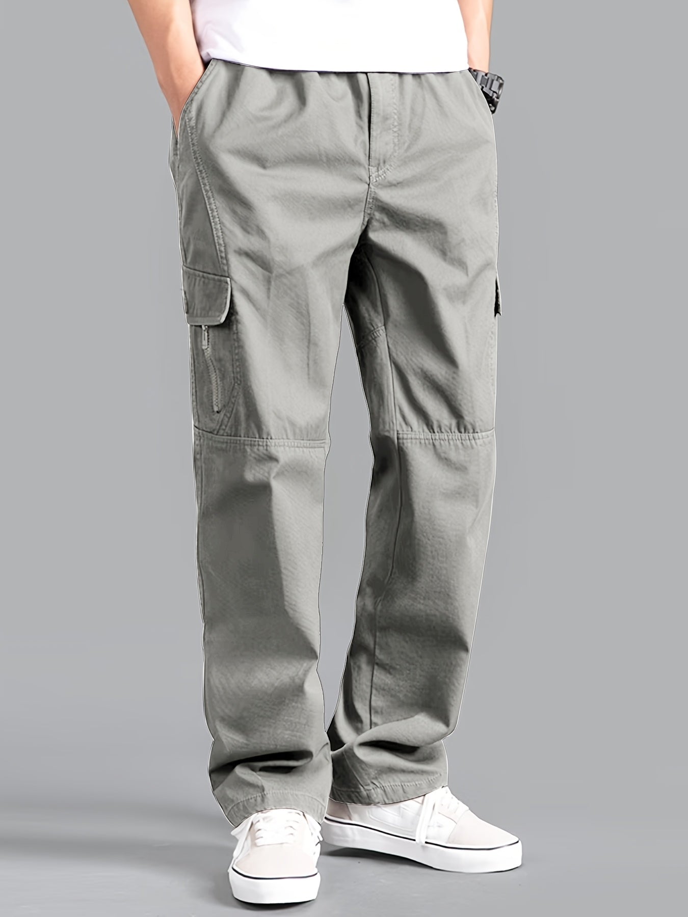 Casual cotton cargo pants for men, with solid color, multi-pocket design, loose fit, and non-stretch woven fabric. Ideal for daily wear in the Spring/Fall Collection.