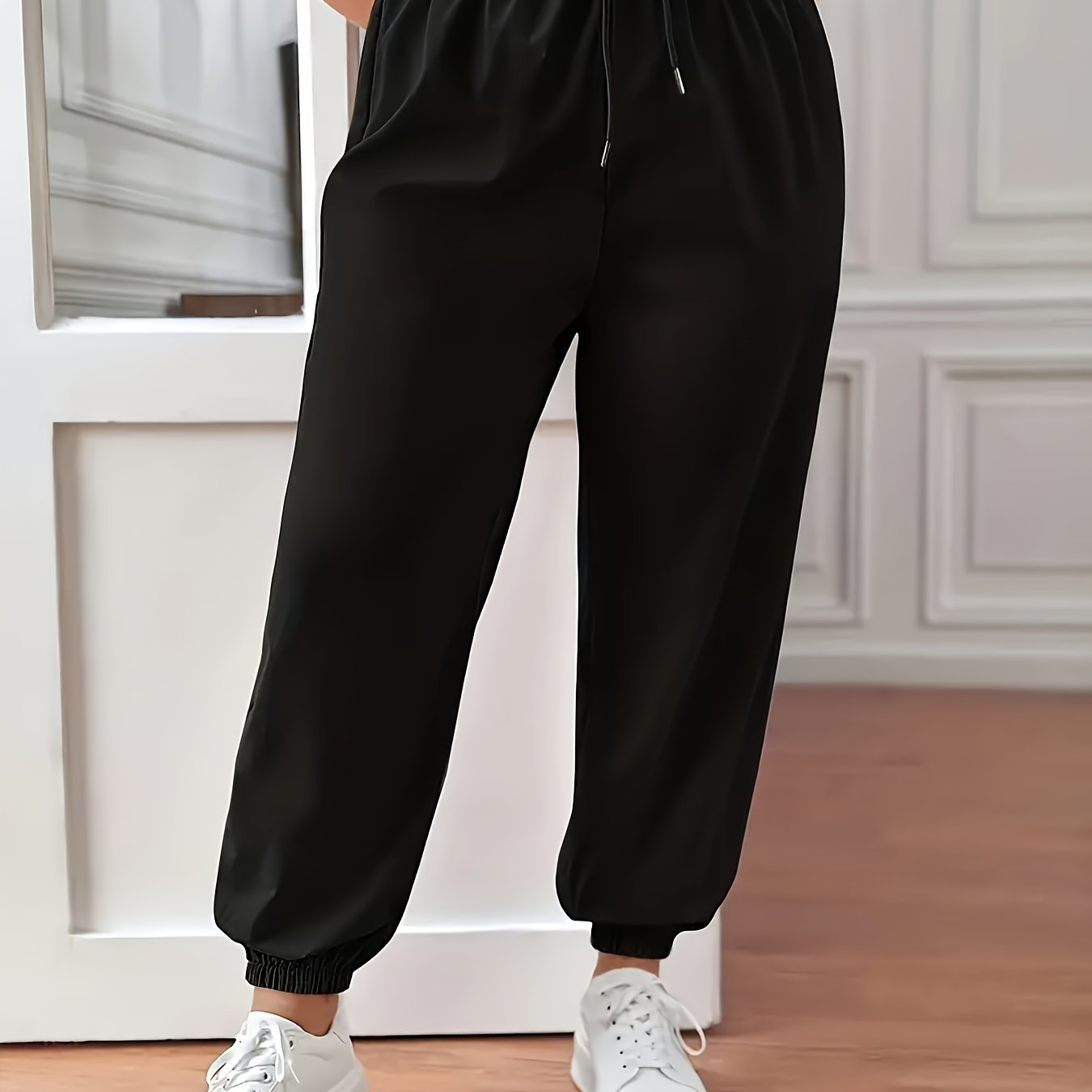 Plus Size Solid Fitted Joggers with Drawstring Waist for Spring/Summer Casualwear by Women's Plus Size Clothing.