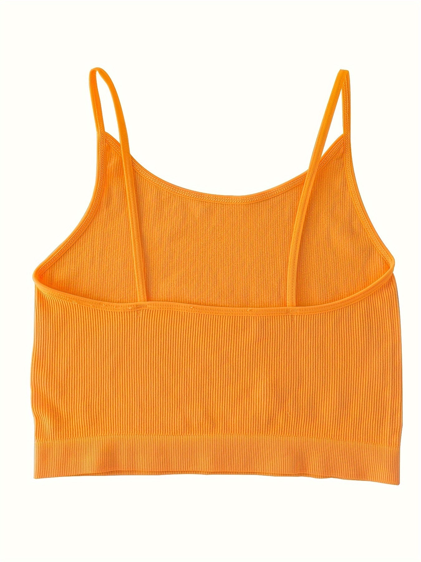 4 seamless camisole tank bras in vibrant and neutral colors made from a stretchy nylon blend are perfect for sports and leisure. They are machine washable and feature a no-pad design for