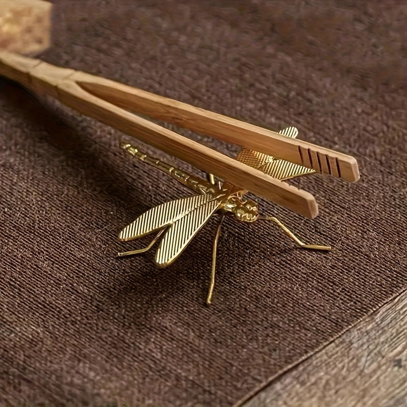 Gold dragonfly tea pet - intricate metal collectible for desk and living room decor, no electricity needed.