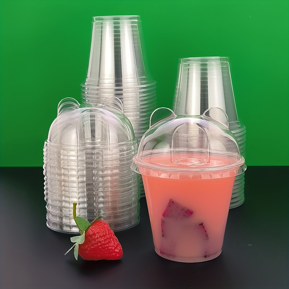 50 pieces of transparent plastic cups with lids, each holding 9oz to 10oz. Perfect for festivals, parties, serving cold drinks, desserts, and coffee. Essential party supplies for any occasion. Add these drinkware accessories to your collection!