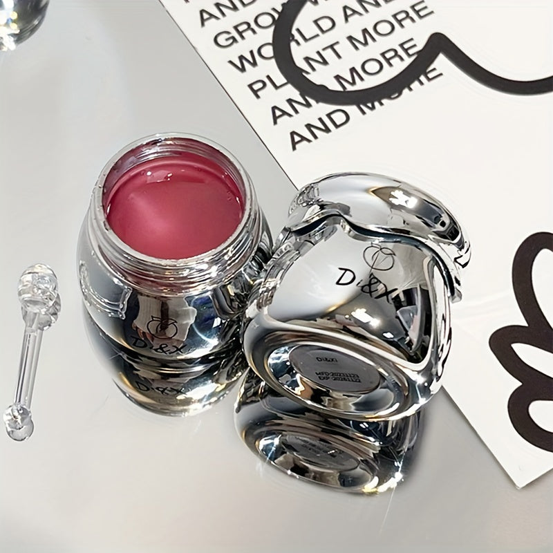 Silvery jar lip balm with peach flavor for moisturizing lips before makeup.