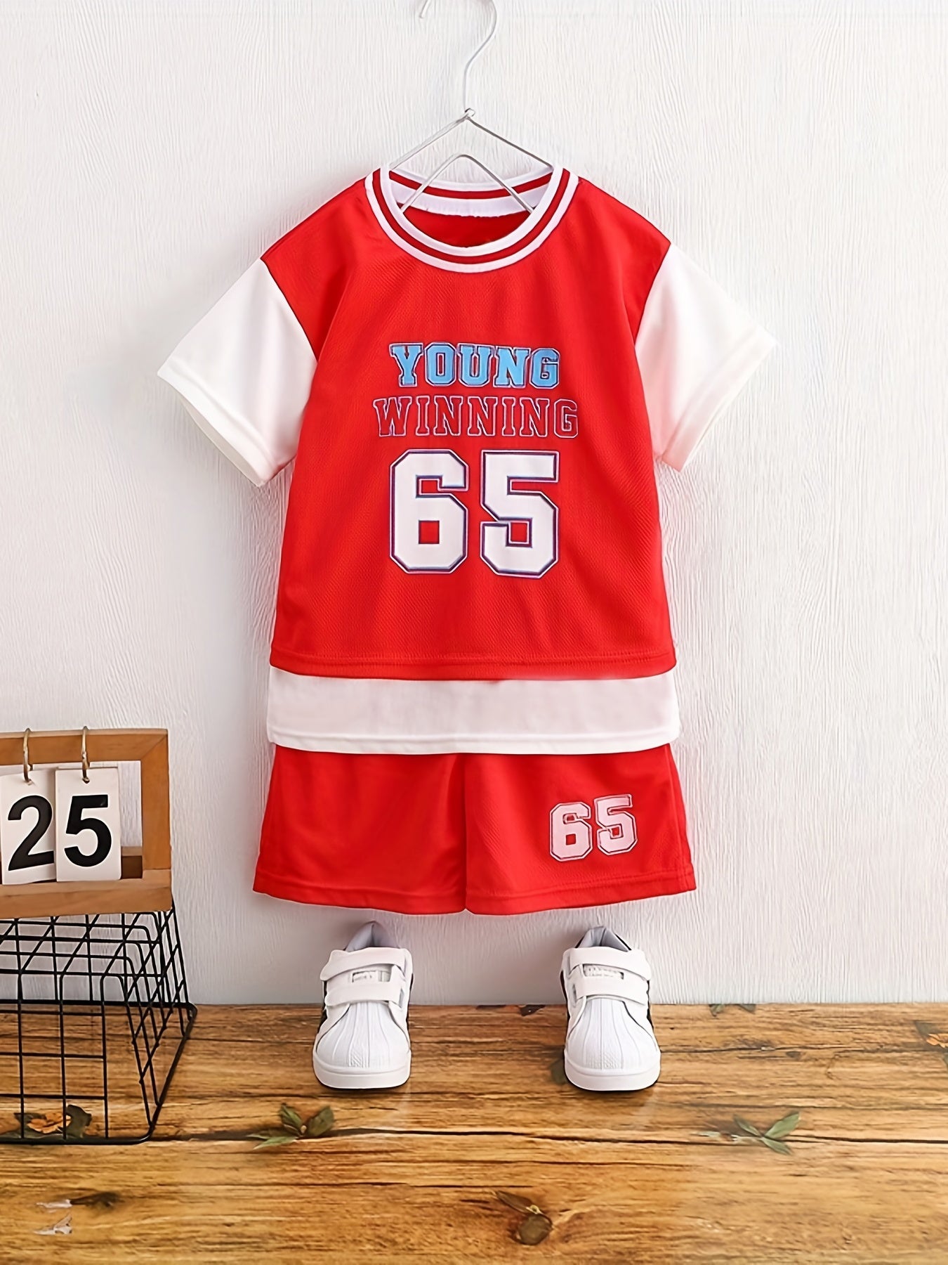 Boy's "Young Winning" casual outfit set includes a round neck t-shirt and shorts, perfect for daily and outdoor wear.