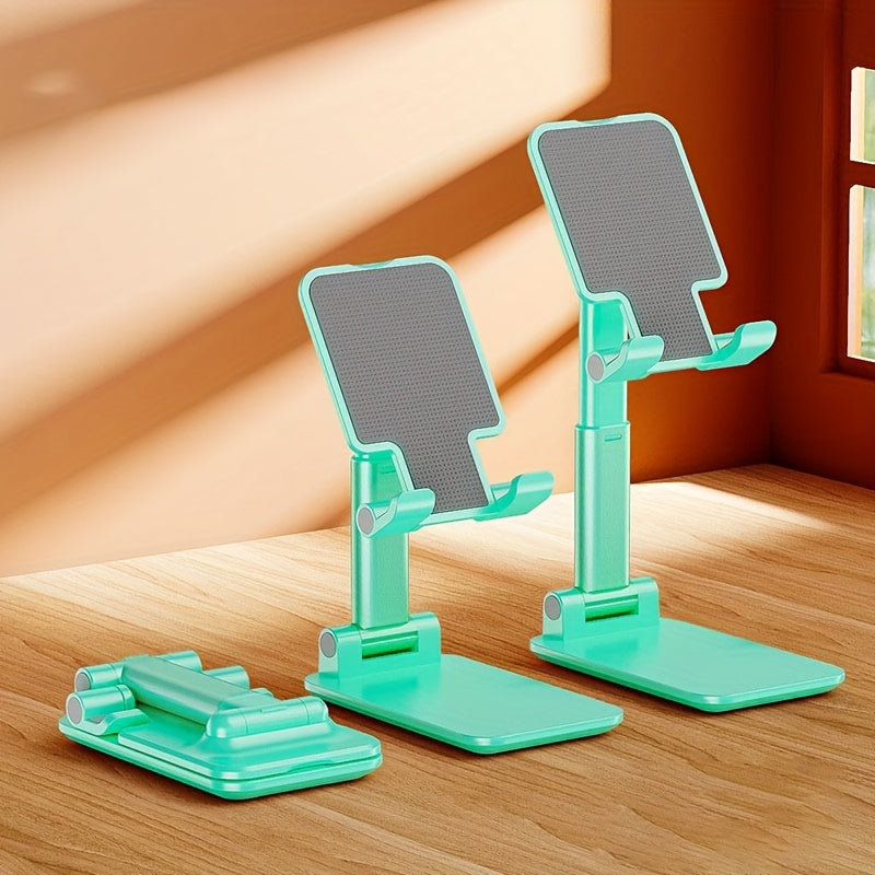 Foldable portable mobile phone and tablet bracket for office use.