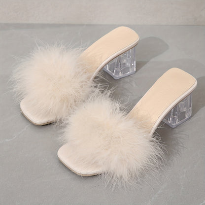 Chunky heel sandals with faux fur decor and square toe design for summer dressy looks.