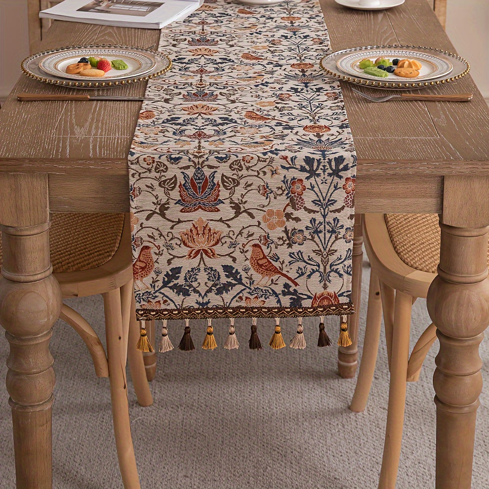 Vintage floral and bird jacquard table runner with tassels in rustic countryside style. Made of polyester, 33cm wide. Ideal for dining, coffee, and tea tables. Vintage design with polyester fabric.