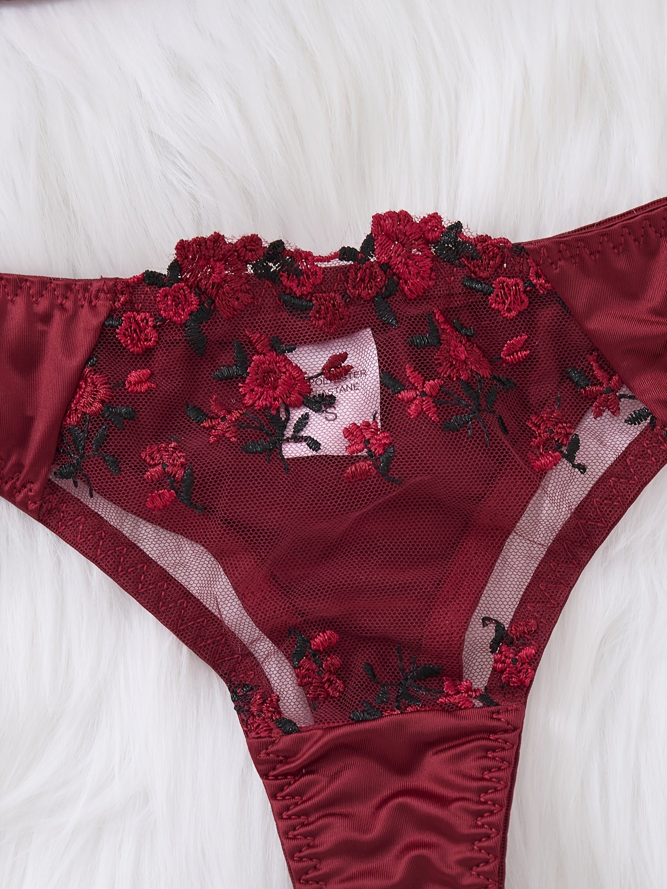 Valentine's Day lingerie set with floral embroidery, push-up bra and triangle panties.