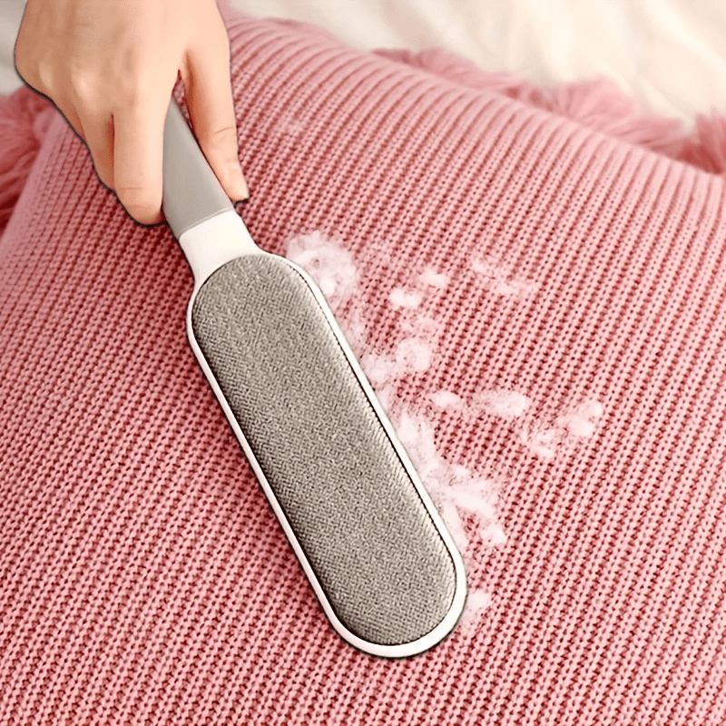 Introducing the versatile and eco-friendly Dust Brush - perfect for removing pet hair, lint, and keeping your clothes, sofas, furniture, bedding, and carpets clean. An essential tool for every living room!