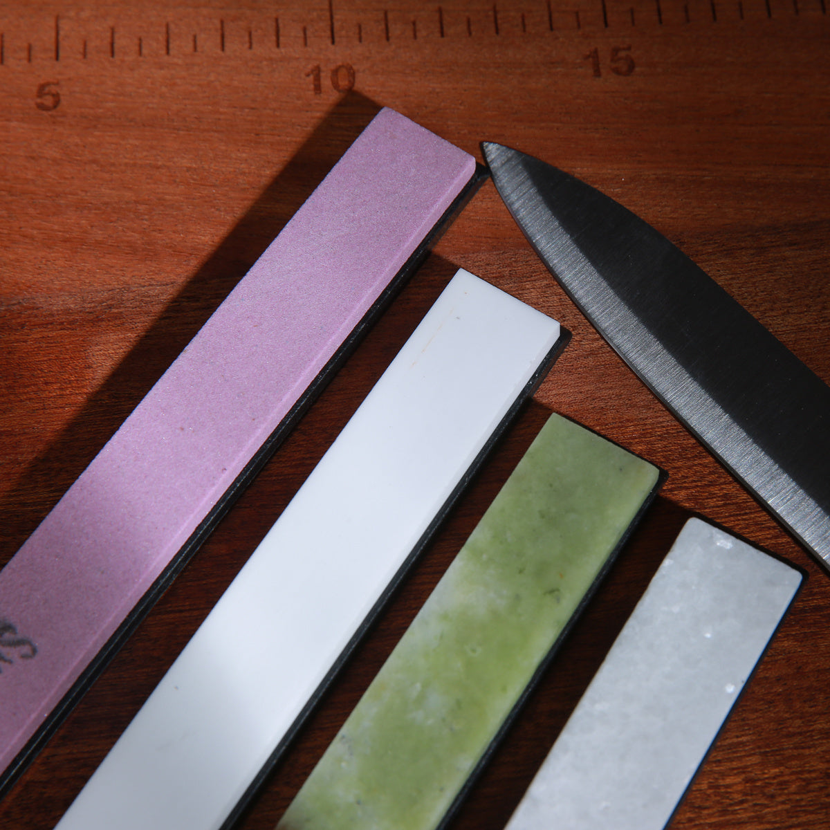 A set of 5 high-quality glass whetstone sharpening stones, perfect for use with a fixed angle knife sharpener. No electricity required, making them ideal for sharpening kitchen utensils. Compatible with Ruixin Pro.