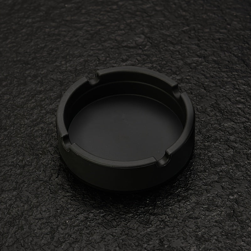 Round silicone ashtray for home or office use, suitable as a gift.