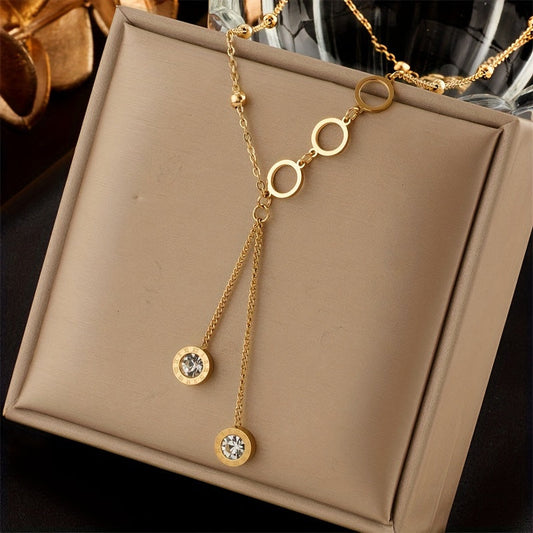 Get a touch of elegance with the 1 Pc Golden Stainless Steel Circle Pendant Necklace, a luxurious and stylish accessory perfect for any occasion. This sexy minimalist design adds a trendy touch to your look, making it a versatile choice for streetwear