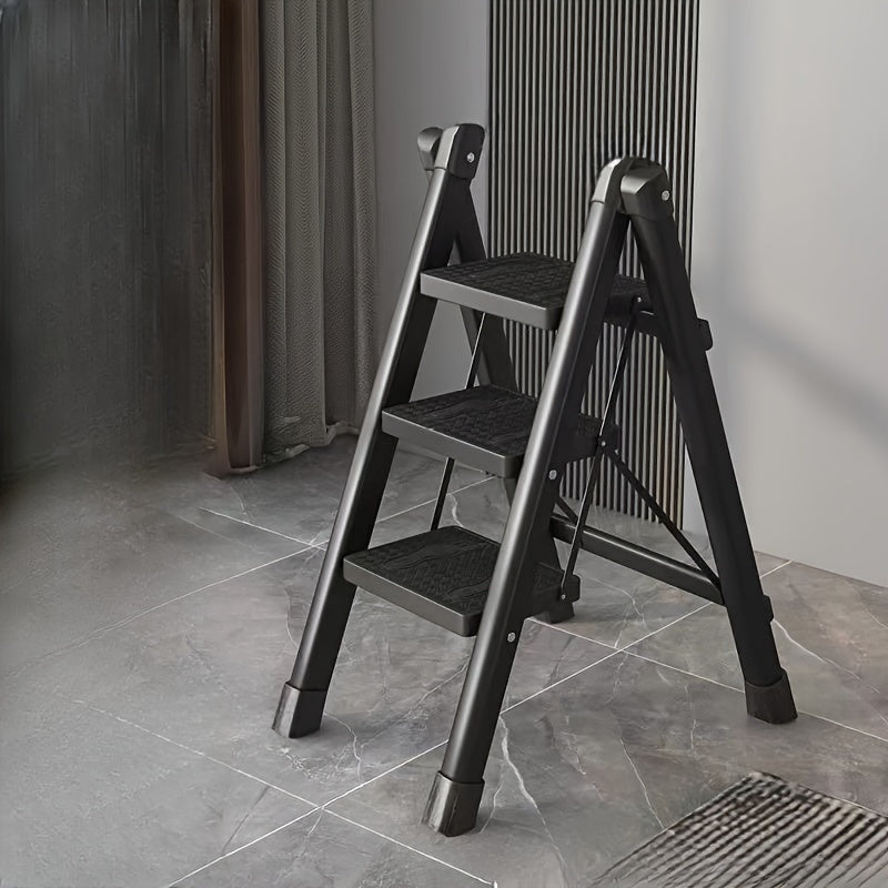 Lightweight folding step ladder for household use with wide, non-slip pedals. Suitable for adults.