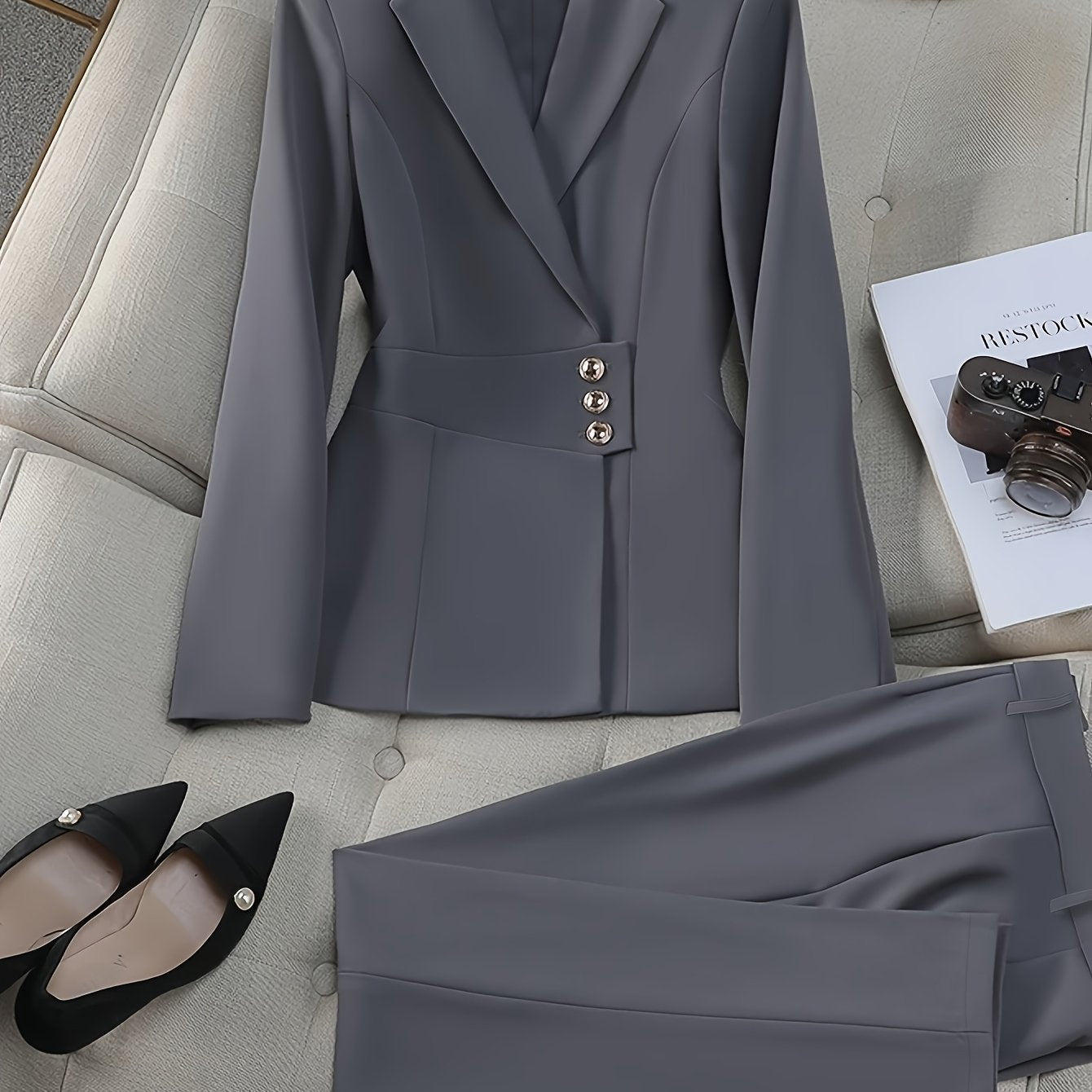 Elegant gray office suit set with double-breasted blazer and slim-fit pants, perfect for professional settings. Made of polyester/spandex and machine washable.