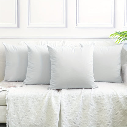 Pack of 4 machine-washable white pillow covers in solid polyester, zippered for easy use. Suitable for various room styles. Decorative sofa cushion covers, no insert included.