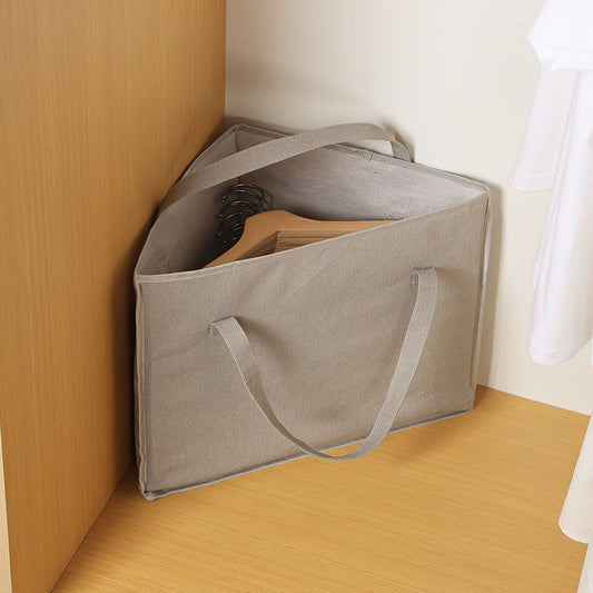 Get organized with the 1pc Hanger Storage Organizer! This Triangle Bag features a handle and bottom plate for easy carrying and space saving storage. Conveniently store your hangers for Halloween or Christmas gifts.