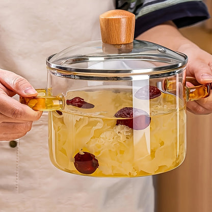 Heat-resistant borosilicate glass saucepan with a 1.5L capacity and lid. This clear stovetop glass cooker pot is dishwasher and oven safe. It is a non-patterned cooking pot suitable for making soup, stew, and sauce, holding up to 52 oz (1500 ml).