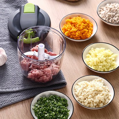 The Versatile Manual Food Chopper and Meat Grinder is perfect for chopping salads, vegetables, and food for youngsters. With its easy hand-crank operation, it is an ideal kitchen gadget.