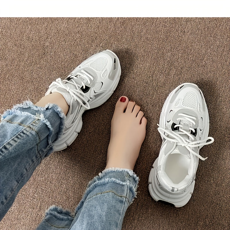 Breathable mesh sneakers for women with slip-on style and lace-up heels.