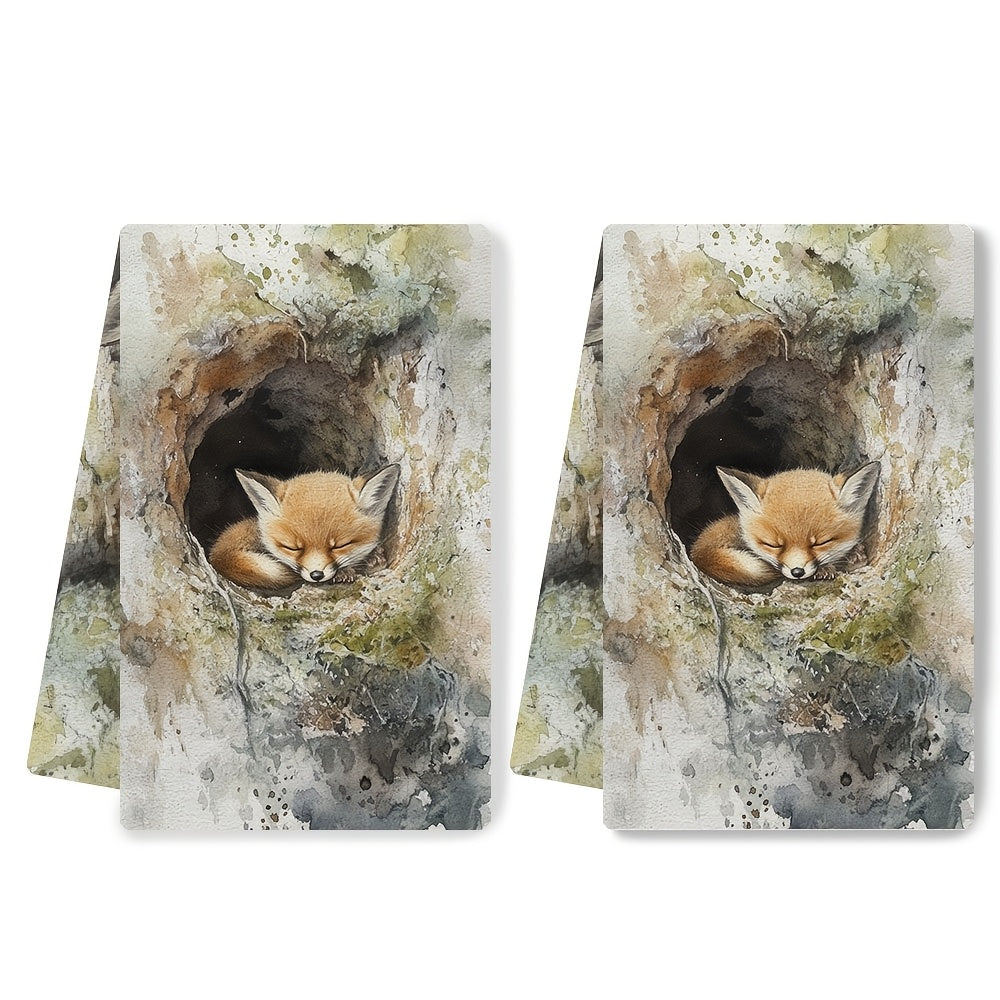 Two pieces of kitchen towels that are ultra soft and feature the soft, furry face of a baby fox exploring its den. These highly absorbent dish hand towels are perfect for holiday decor. They are machine washable and measure 16x24 inches. Item number