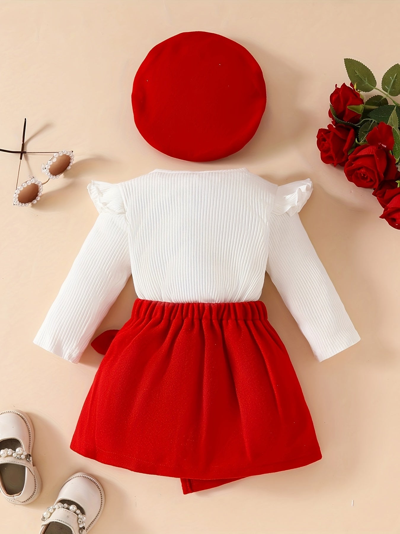 Knitted fabric crew neck long sleeve t-shirt with solid color flared skirt, beret, and knee-high bow detail outfit for fall/winter.