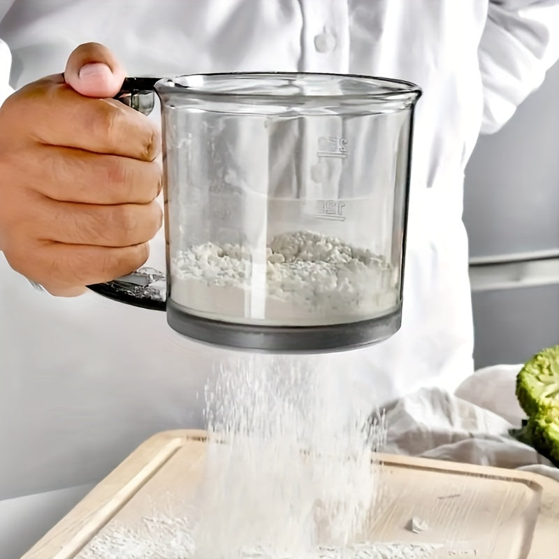 1 piece of a semi-automatic flour sifter with a 2-cup capacity and hand press design. Made of BPA-free materials, this flour sieve is a must-have baking tool and kitchen gadget.