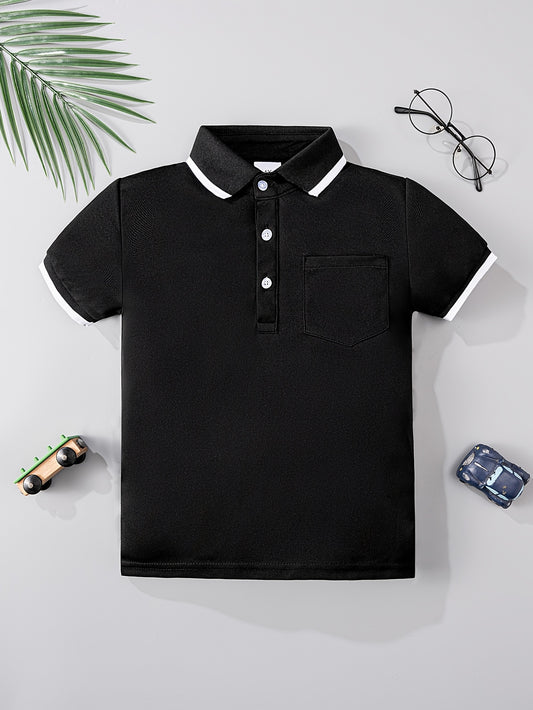 Boys' classic black and white shirt made of casual knit fabric, featuring short sleeves and a pocket detail, ideal for summer.