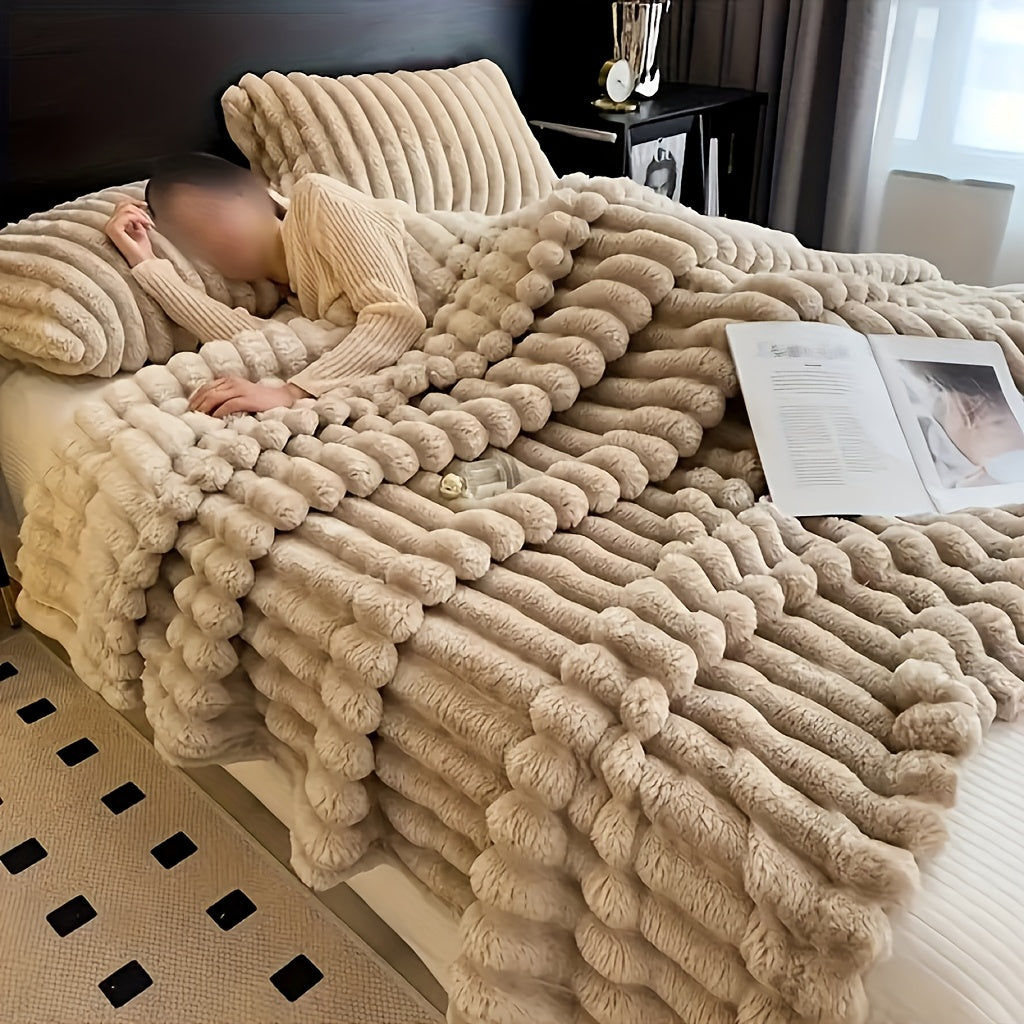 Indulge in the comfort of our luxurious plush blanket - a cozy fleece throw that will keep you warm and snuggled up on the sofa. This soft and insulating blanket is not only perfect for lounging, but also machine washable for easy care. Its modern style