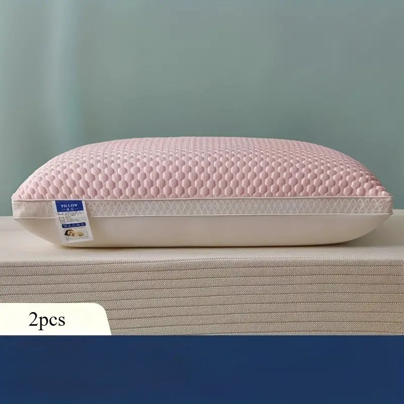 Two cooling tofu pillows designed for neck and spine support. These pillows also provide a relaxing sleep massage and feature breathable, moisture-wicking properties. Perfect for adding a decorative touch to your living room or bedroom.