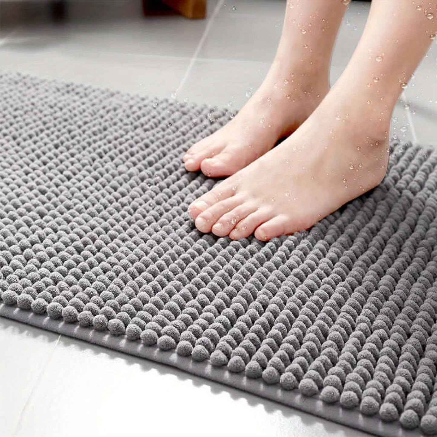 Get this luxurious Chenille Bath Mat, 2cm Thick, with a non-slip, super absorbent, quick-dry design. Made of woven polyester with rubber backing, this mat weighs 1450gsm and is perfect for the bathroom, kitchen, bedroom, or entryway. It also makes a