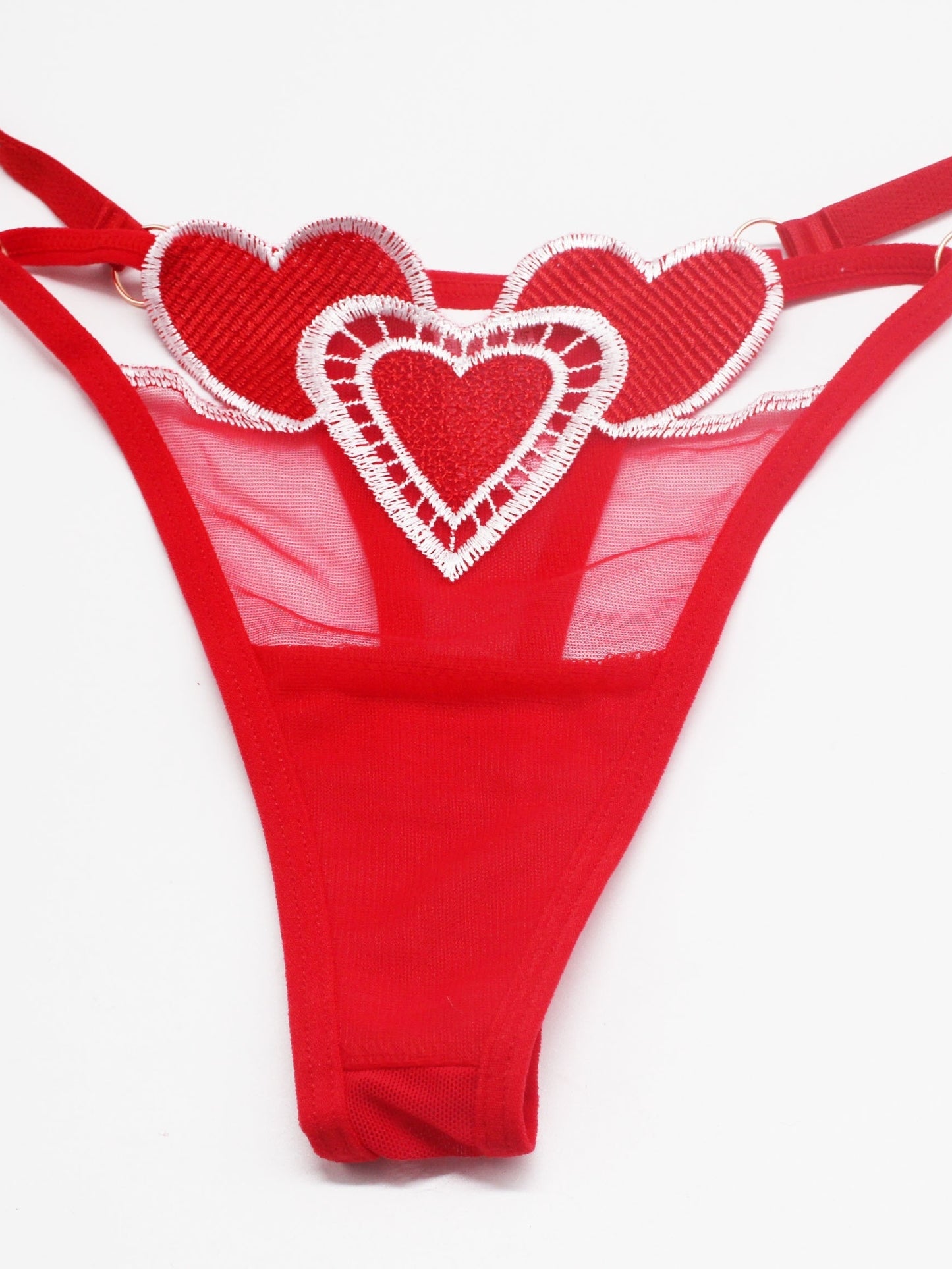 Red adjustable heart lace thong for women with sheer mesh detail. Cute low-rise and breathable design.