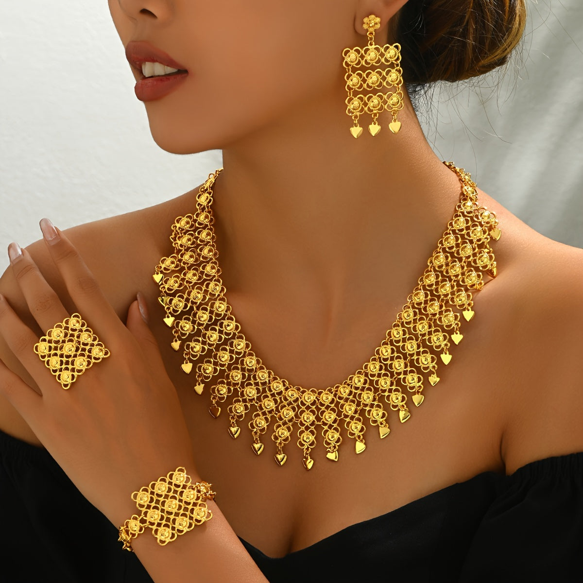 Luxurious Vintage Jewelry Set - Includes Bracelet, Ring, Earrings, and Necklace in 18K Gold-Plated Alloy. Features an Exquisite Filigree Floral Design, Perfect for Weddings, Banquets, or any Season. Set includes 5 pieces.