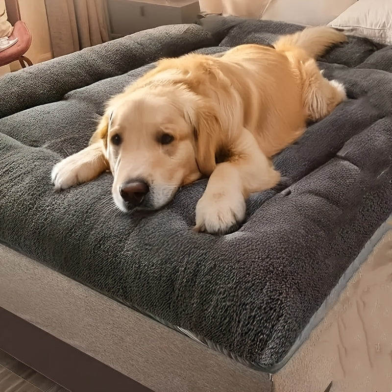 Large plush dog bed for small to large breeds, with non-slip bottom and checkered design for comfort.