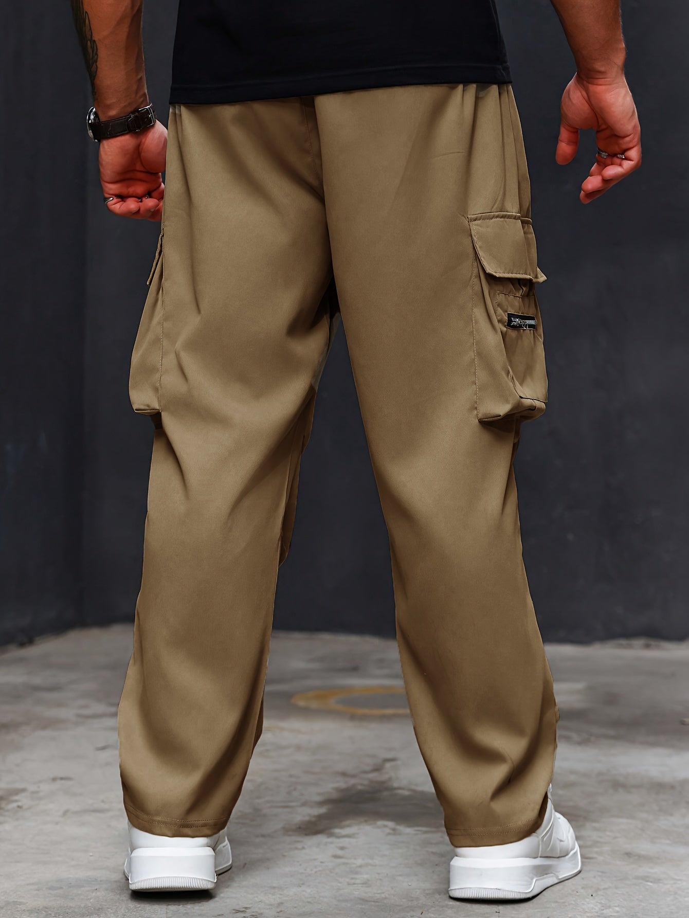 Plus size men's cargo pants with athletic and casual style, regular fit and pockets.