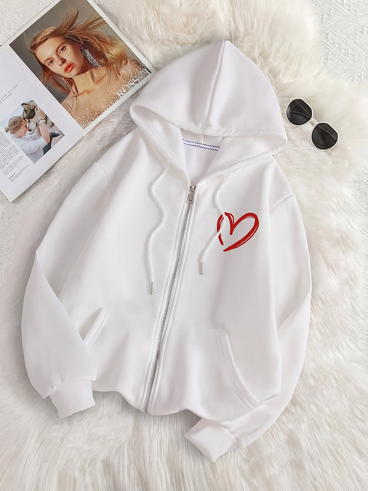 Stylish women's zip-up hoodie with heart print, front pocket, and long sleeves for fall/winter comfort.