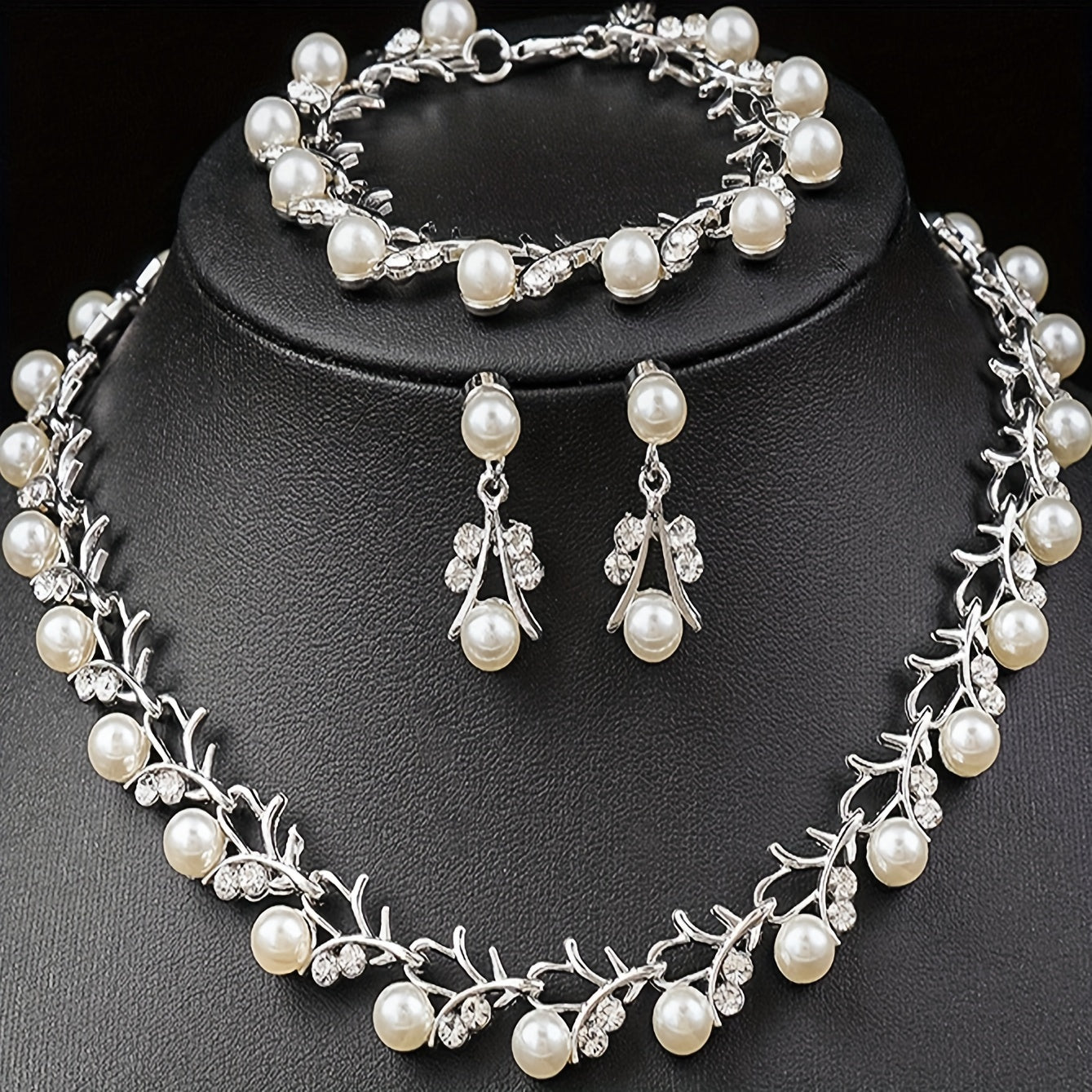 Stylish 4-Piece Jewelry Set for Women - Featuring Faux Pearl Details, Silver-Plated Necklace, Bracelet, and Earrings - Ideal for Weddings, Parties, and Festivals