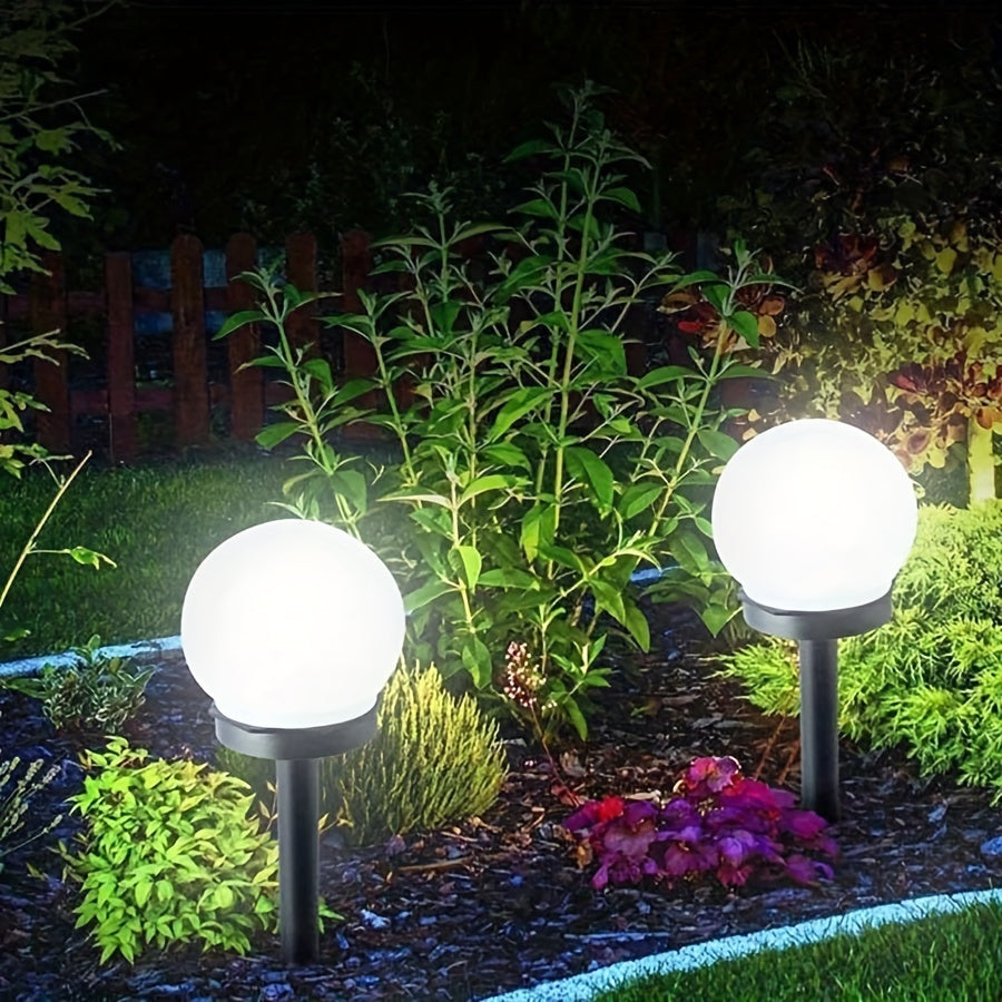 Solar-powered LED garden lights for outdoor landscapes - Durable plastic, automatic on/off, modern design for pathways, yards, decks, lawns, and patios.