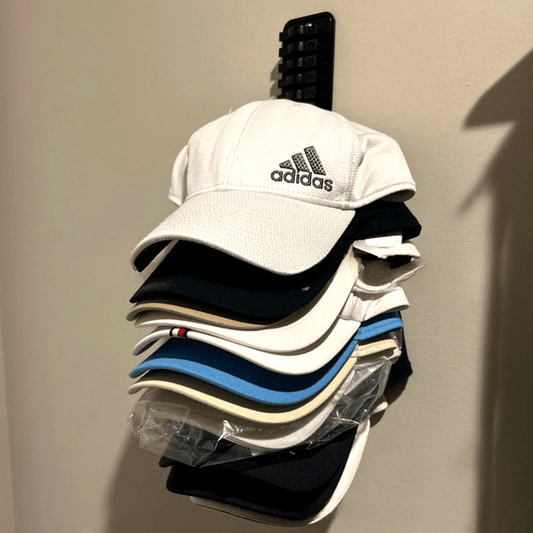 Organize and display baseball caps with this durable plastic wall-mounted cap organizer. Save space with this convenient hat storage rack, perfect for storing and displaying your collection of baseball caps.